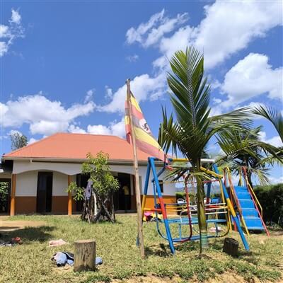 Outside look of the playground and the school at Pineapple Project in Uganda.