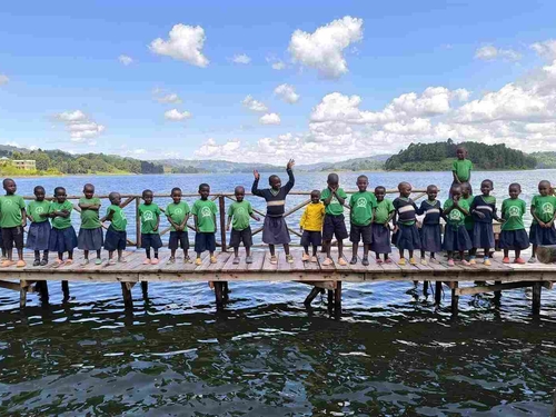 Students ready for swimming lessons at Lake Bunyonyi in Uganda.